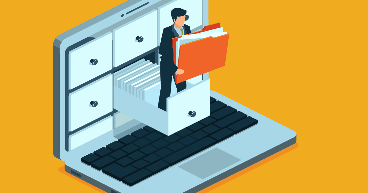 Businessman pulling folder from laptop drawer